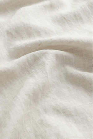 Close-up of the driftwood beige linen-Tencel fabric, highlighting lightweight texture and breathable comfort.
