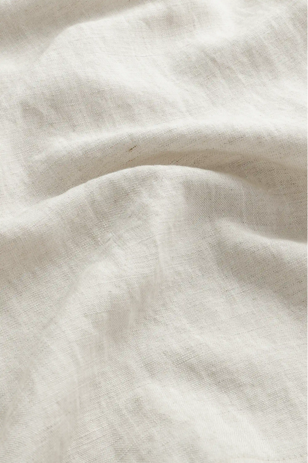 Close-up of the driftwood beige linen-Tencel fabric, highlighting lightweight texture and breathable comfort.
