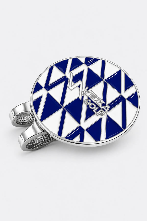 Close-up angled view of VEZA GOLF blue geometric magnetic hat clip with chrome finish