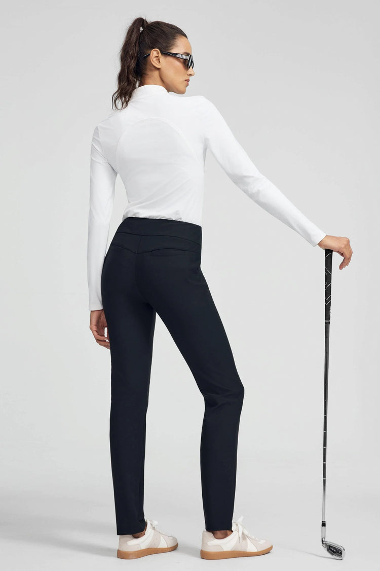 Back view of VEZA women’s onyx black pull-on tailored pant styled with a white performance top