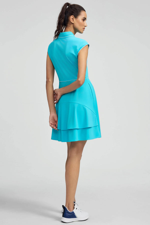 Back view of VEZA skyserve blue cap sleeve zip-front golf dress with a clean, sculpted silhouette
