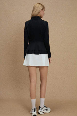Full-body back view of VEZA onyx black peplum mesh zip jacket with breathable mesh panels