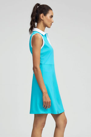 Side view of VEZA women’s skyserve blue sleeveless golf dress with a flattering, streamlined fit