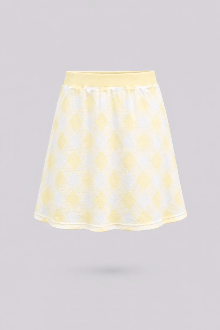 Women’s yellow gingham everyday golf skort with a high-rise waistband and A-line silhouette front view