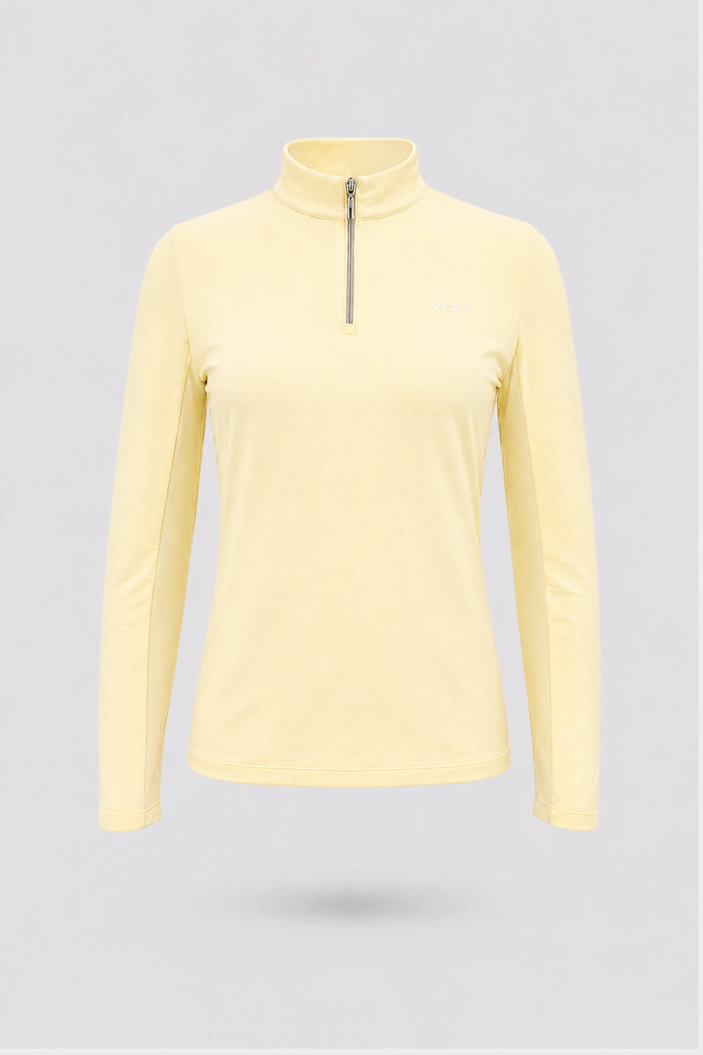 Women’s yellow long sleeve zip-neck golf top with breathable stretch fabric and UV protection front view