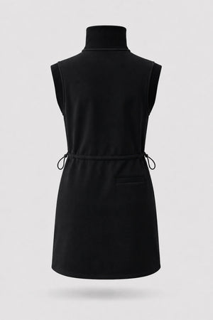 Back view of women's black sleeveless golf dress with stand collar, adjustable drawcord waist and back pocket