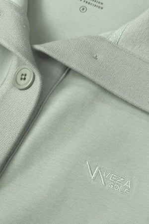 Sage Mist women’s sleeveless golf dress with convertible collar, button detail and VEZA GOLF embroidery
